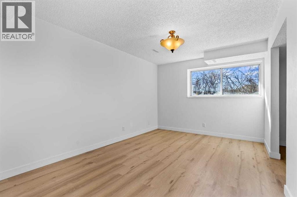 7006A Bowness Road NW — photo 16