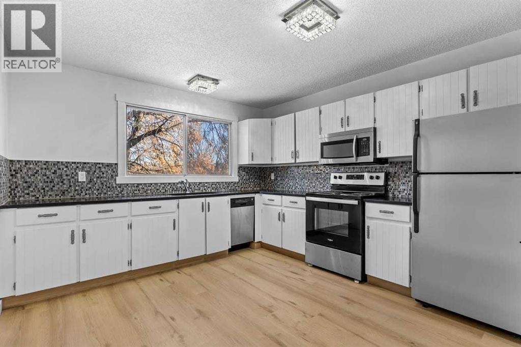 7006A Bowness Road NW — photo 9