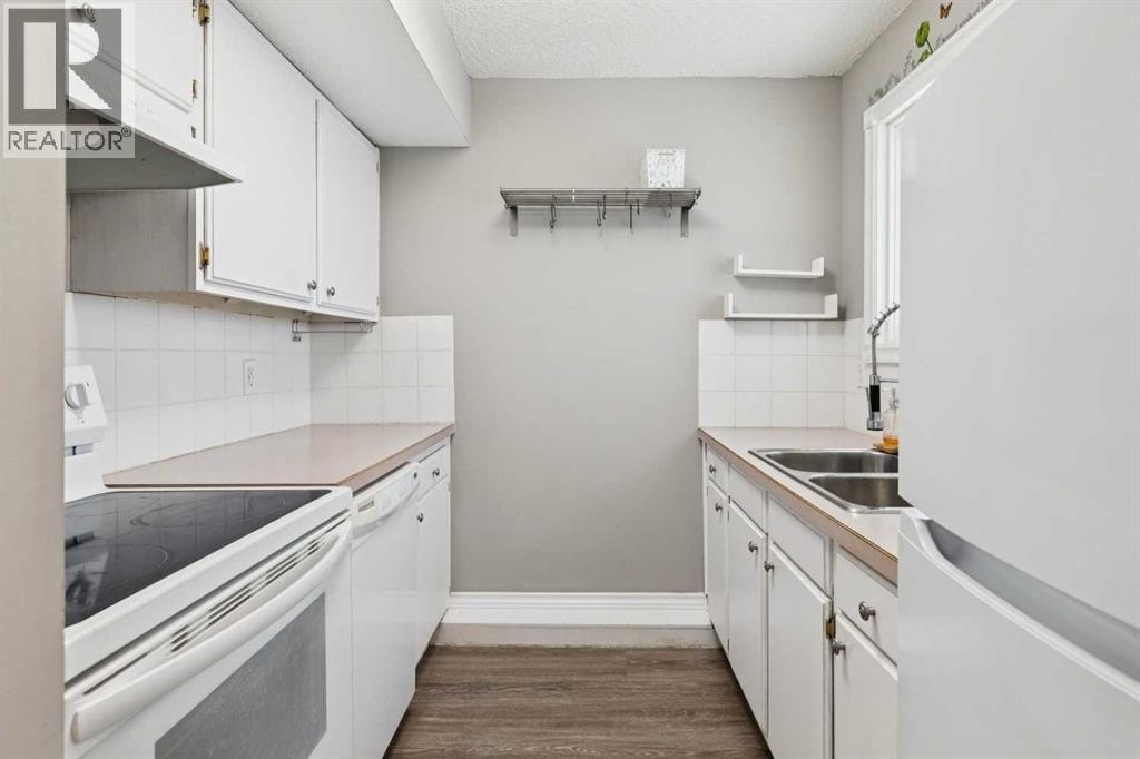 1002, 2520 Palliser Drive SW — photo 12