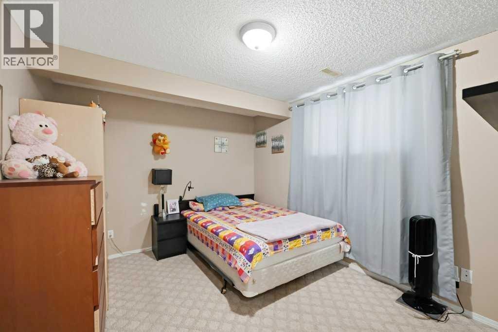 86 Saddlecrest Close NE — photo 37