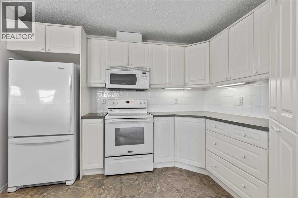 2111, 928 Arbour Lake Road NW — photo 7