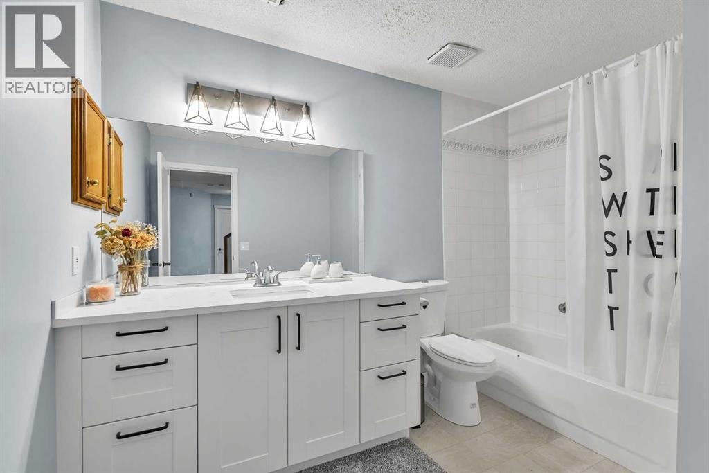 215 Edgevalley Mews — photo 44