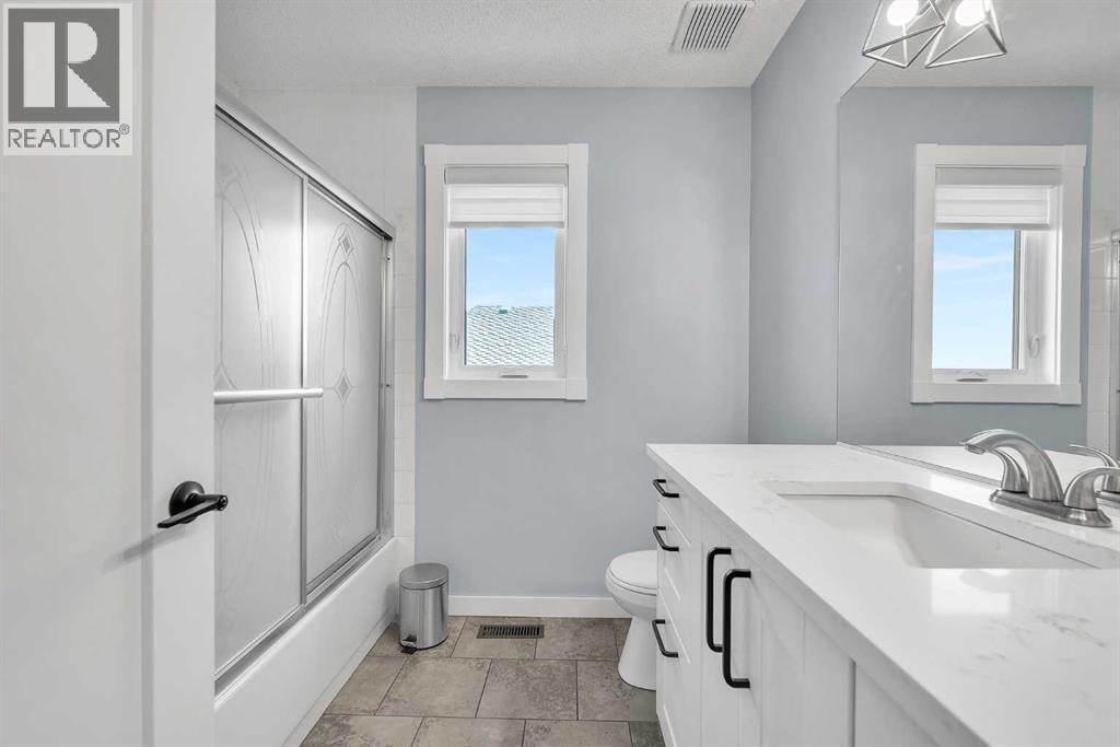 215 Edgevalley Mews — photo 36