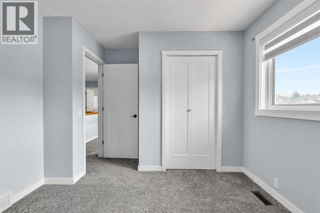 215 Edgevalley Mews — photo 34