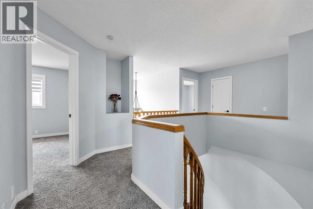 215 Edgevalley Mews — photo 21