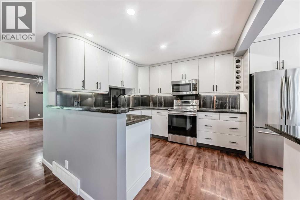 572 Point Mckay Grove NW — photo 20
