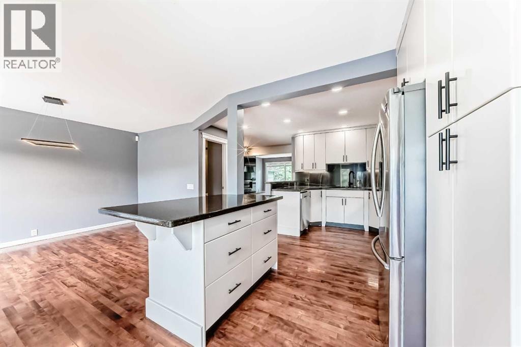 572 Point Mckay Grove NW — photo 16