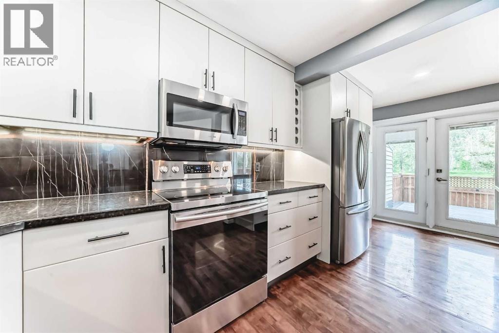 572 Point Mckay Grove NW — photo 18