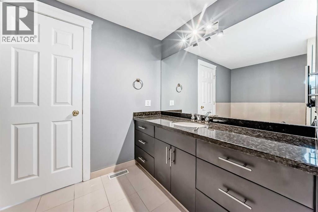 572 Point Mckay Grove NW — photo 30