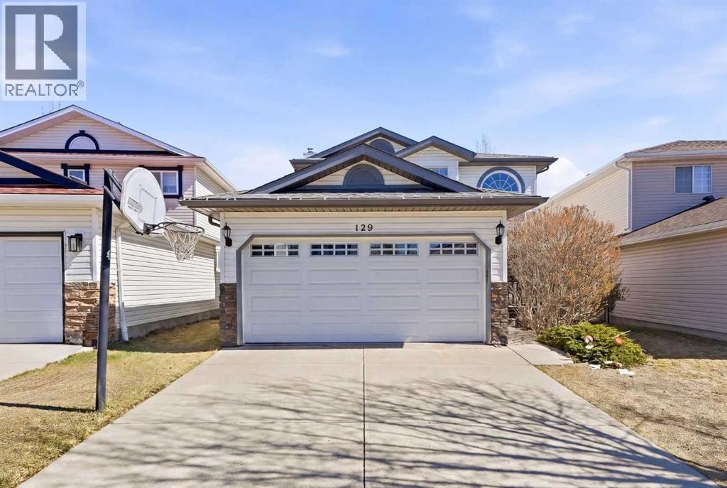 129 Arbour Ridge Circle NW — photo 1