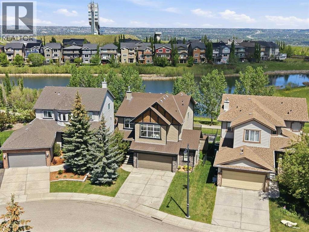 114 Cougarstone Crescent SW — photo 2