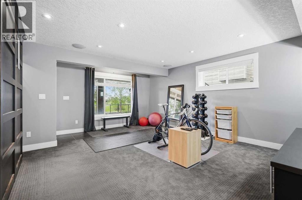 114 Cougarstone Crescent SW — photo 34