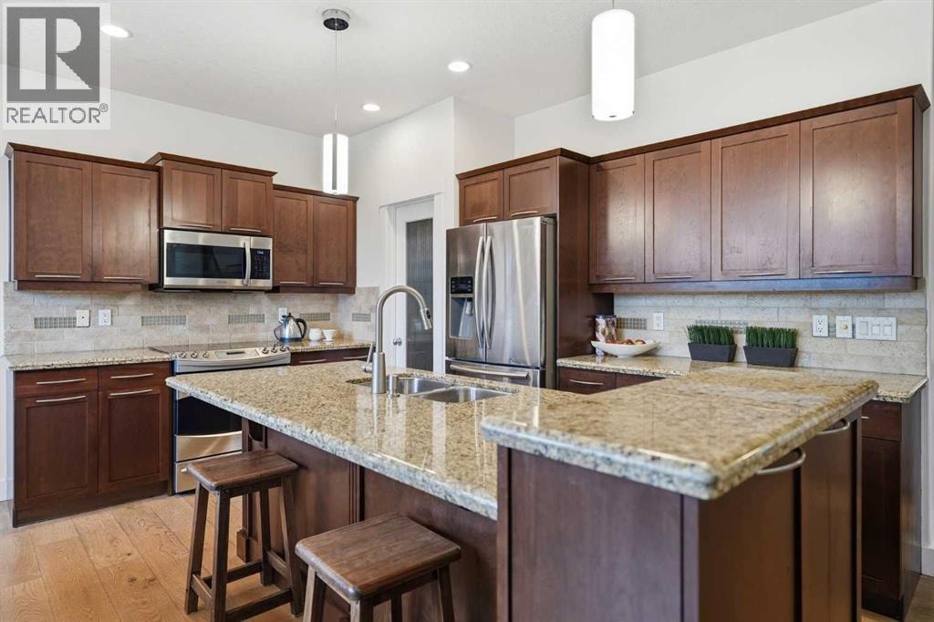 114 Cougarstone Crescent SW — photo 20