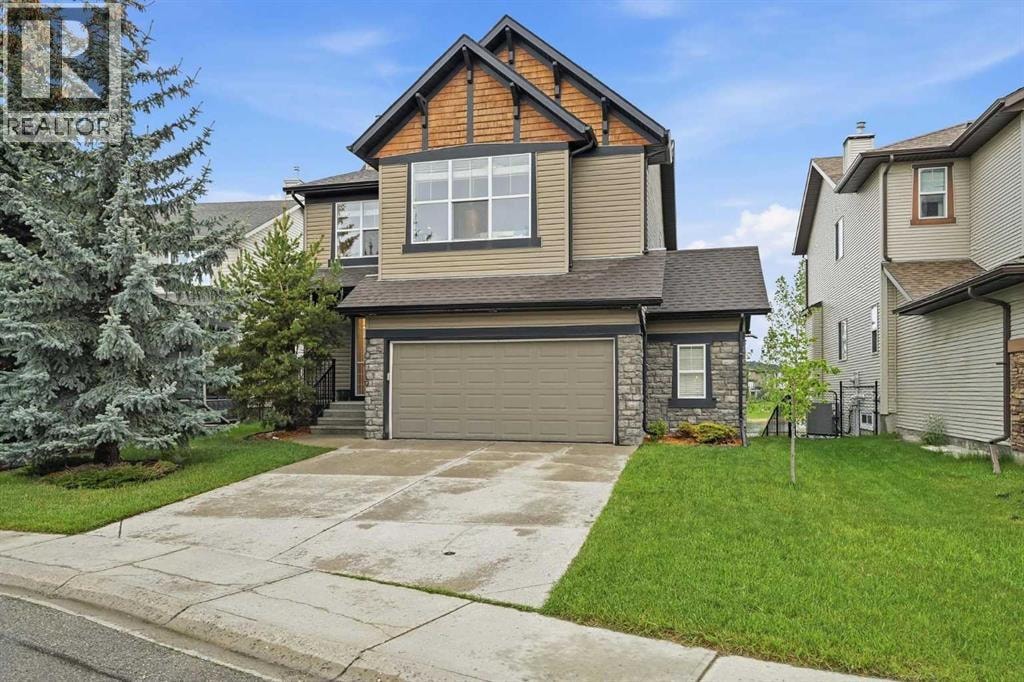 114 Cougarstone Crescent SW — photo 3