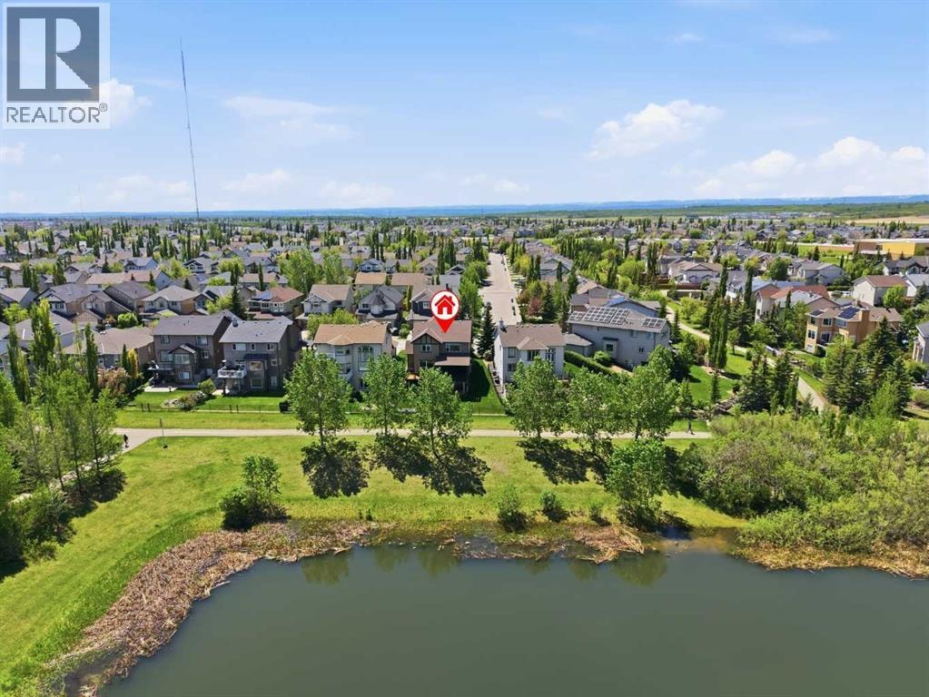 114 Cougarstone Crescent SW — photo 49