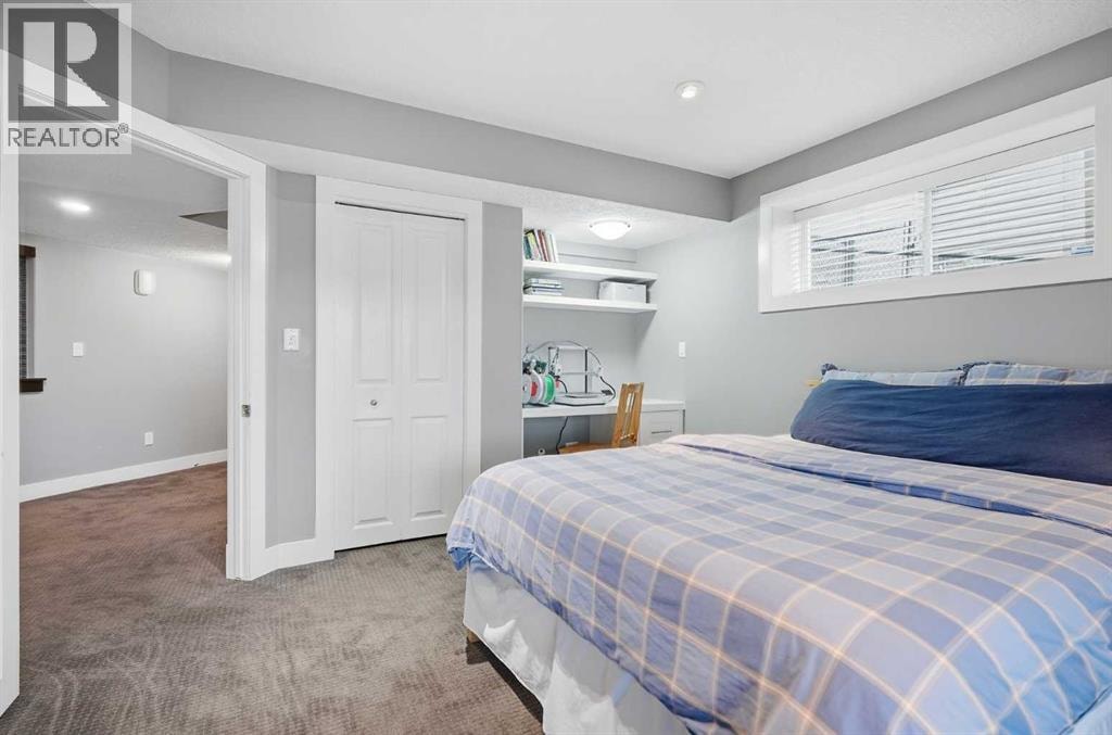 114 Cougarstone Crescent SW — photo 38