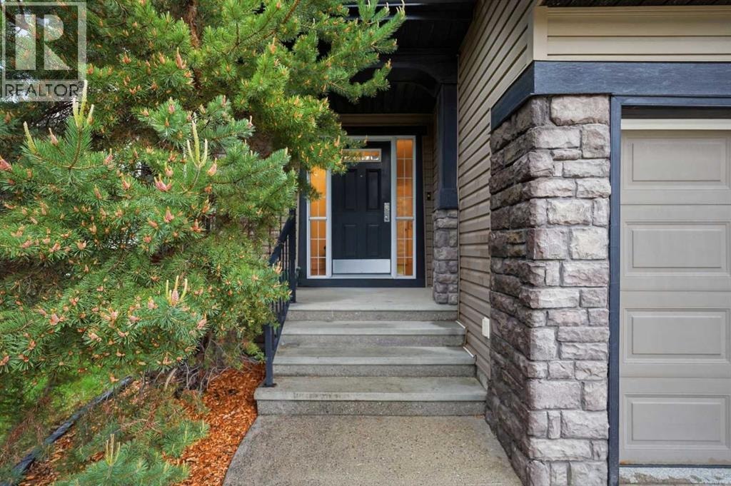 114 Cougarstone Crescent SW — photo 4