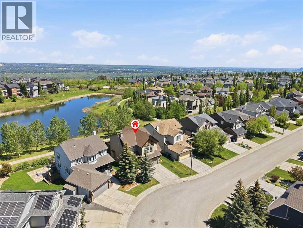 114 Cougarstone Crescent SW — photo 48