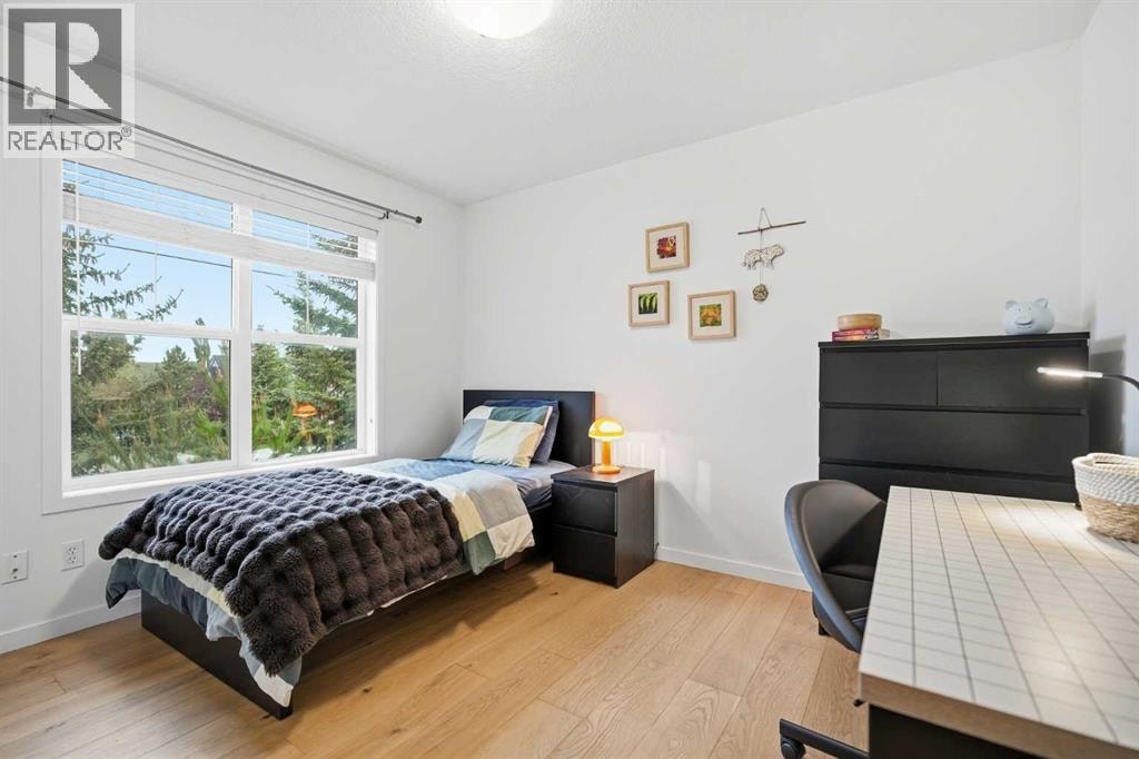 114 Cougarstone Crescent SW — photo 32