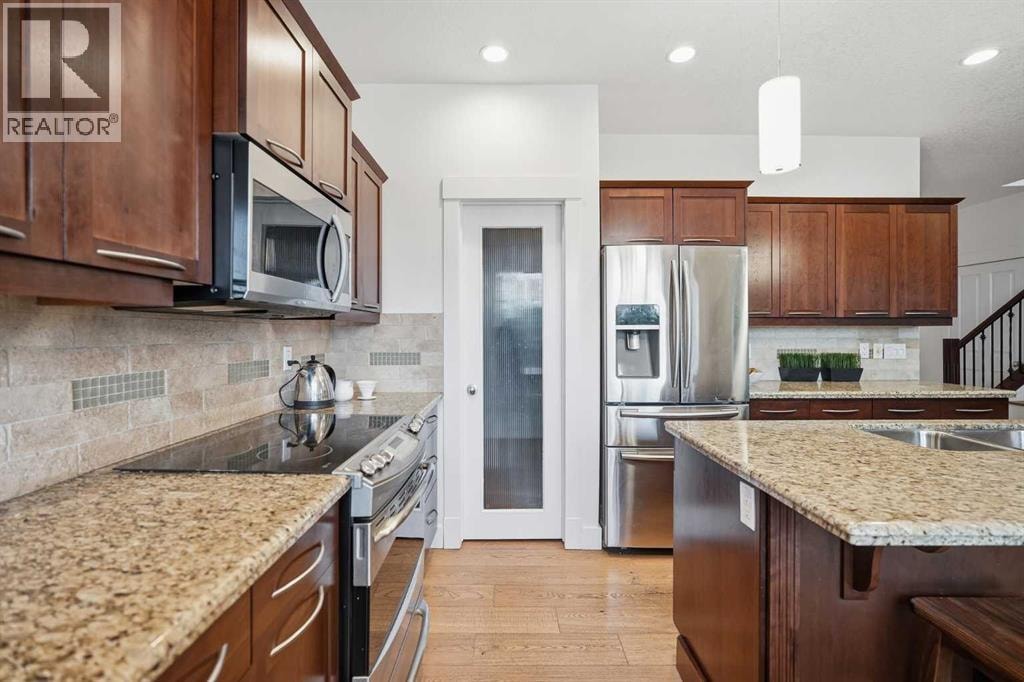 114 Cougarstone Crescent SW — photo 21