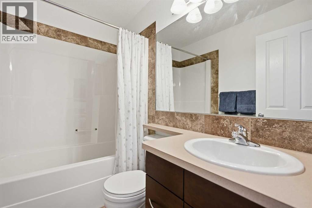 114 Cougarstone Crescent SW — photo 31