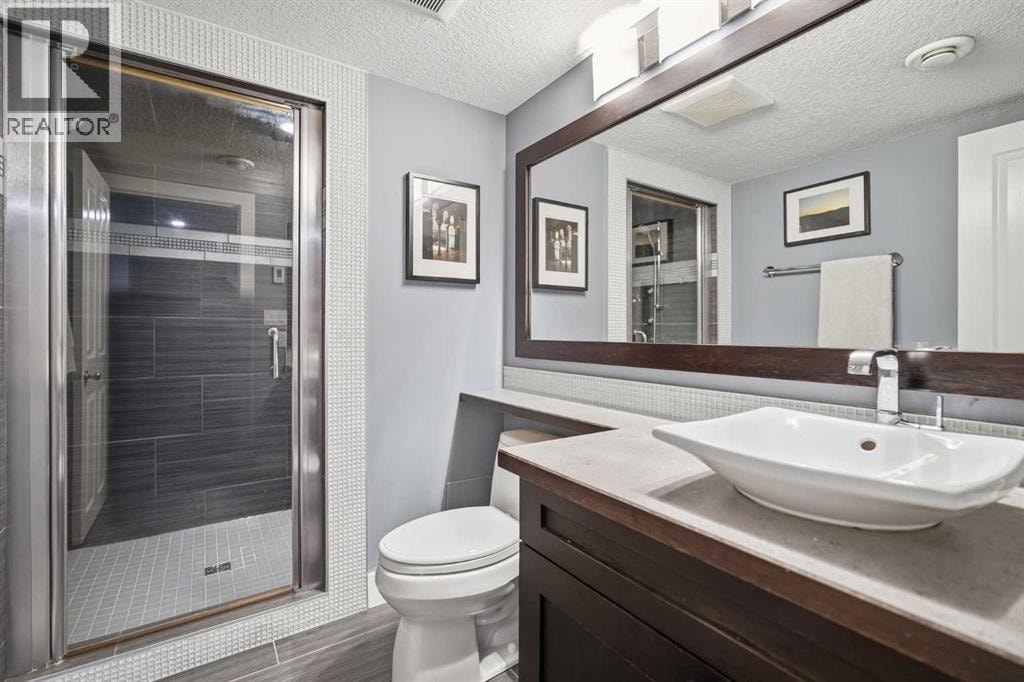 114 Cougarstone Crescent SW — photo 39