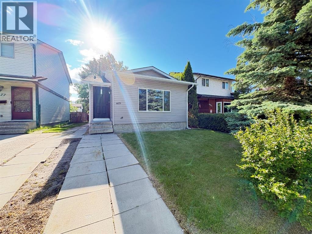 6879 Rundlehorn Drive NE — photo 2