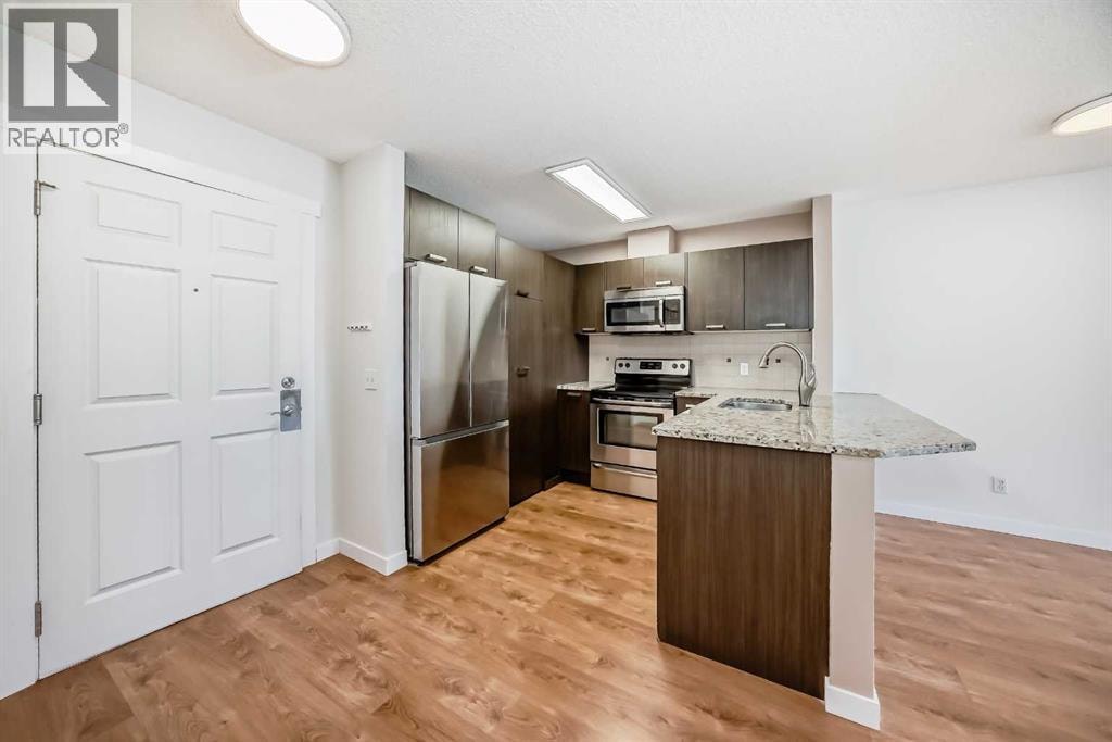 1318, 950 Arbour Lake Road NW — photo 5