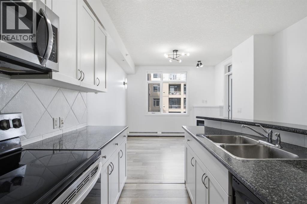 438, 930 Centre Avenue NE — photo 13