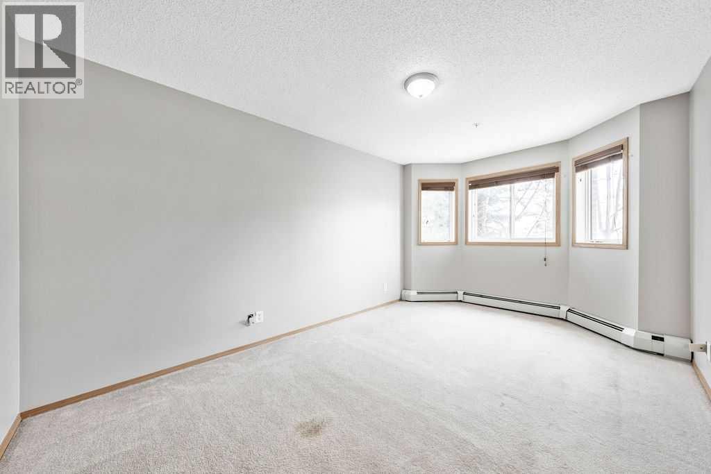 103, 92 Saddletree Court NE — photo 7