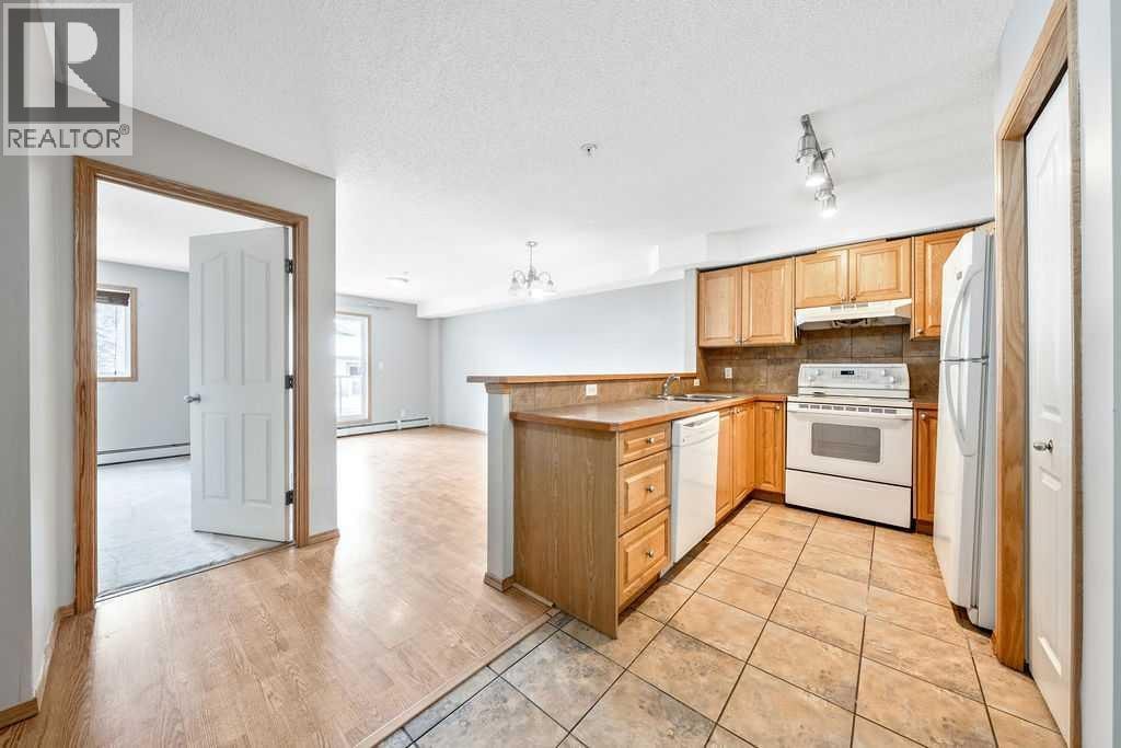 103, 92 Saddletree Court NE — photo 3