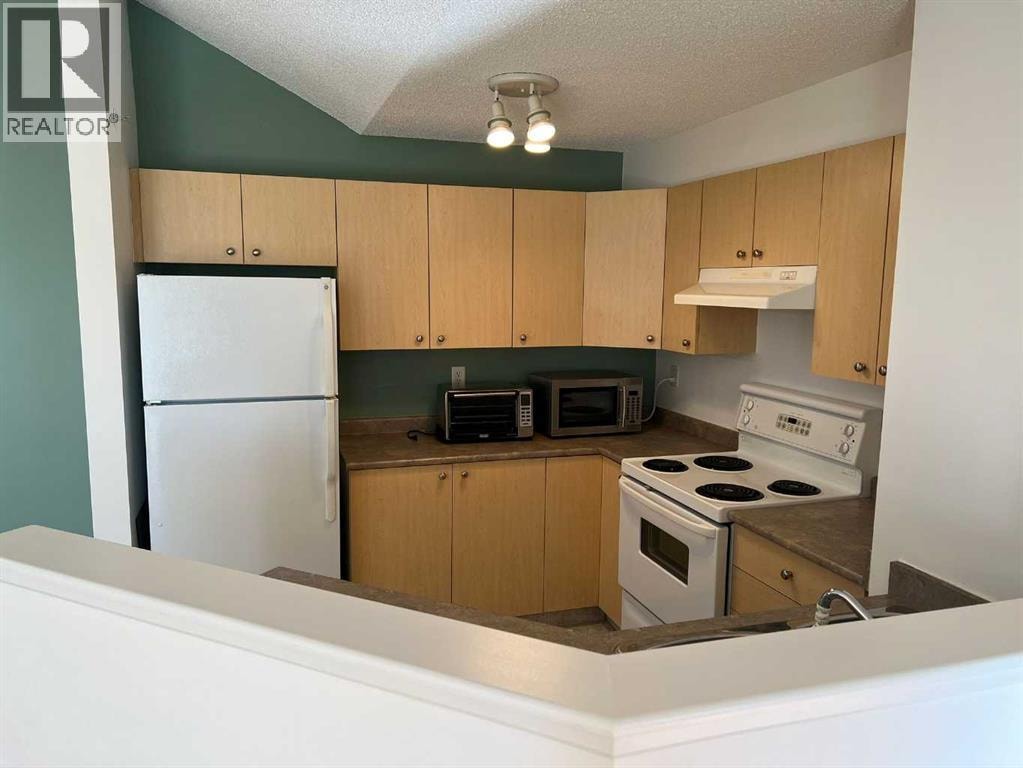 408, 16 Country Village Bay NE — photo 7
