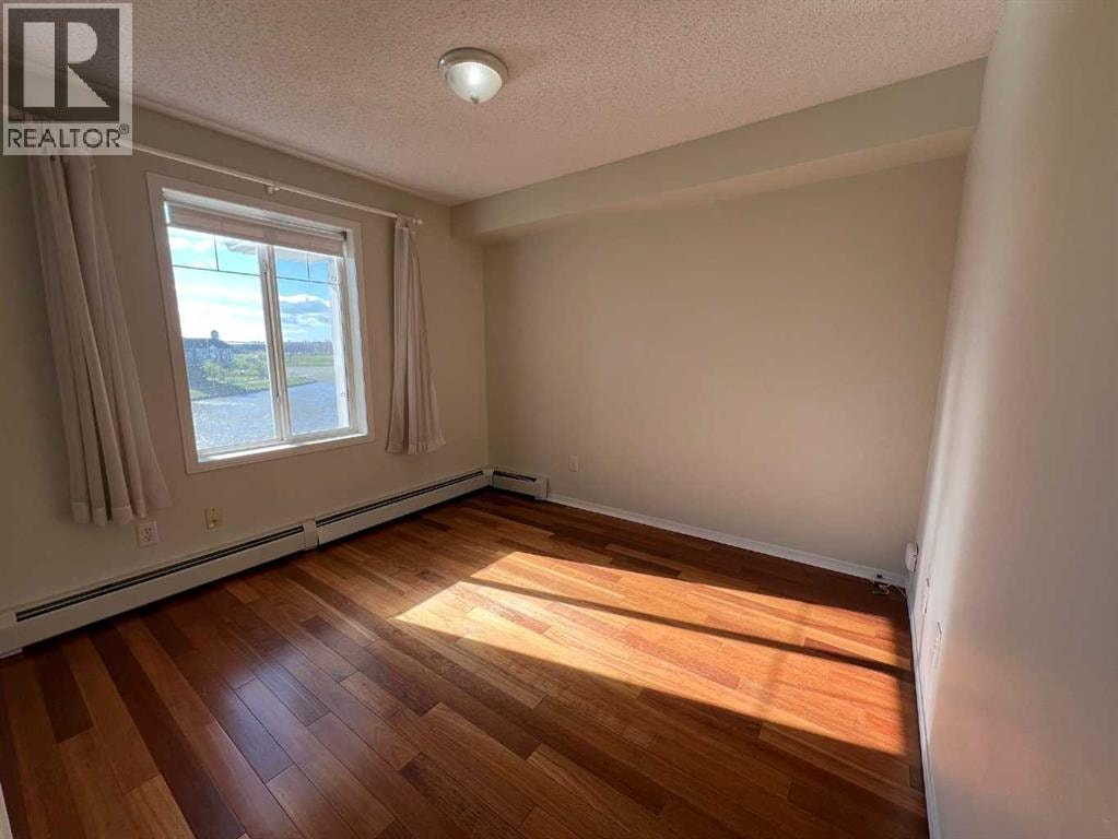 408, 16 Country Village Bay NE — photo 14