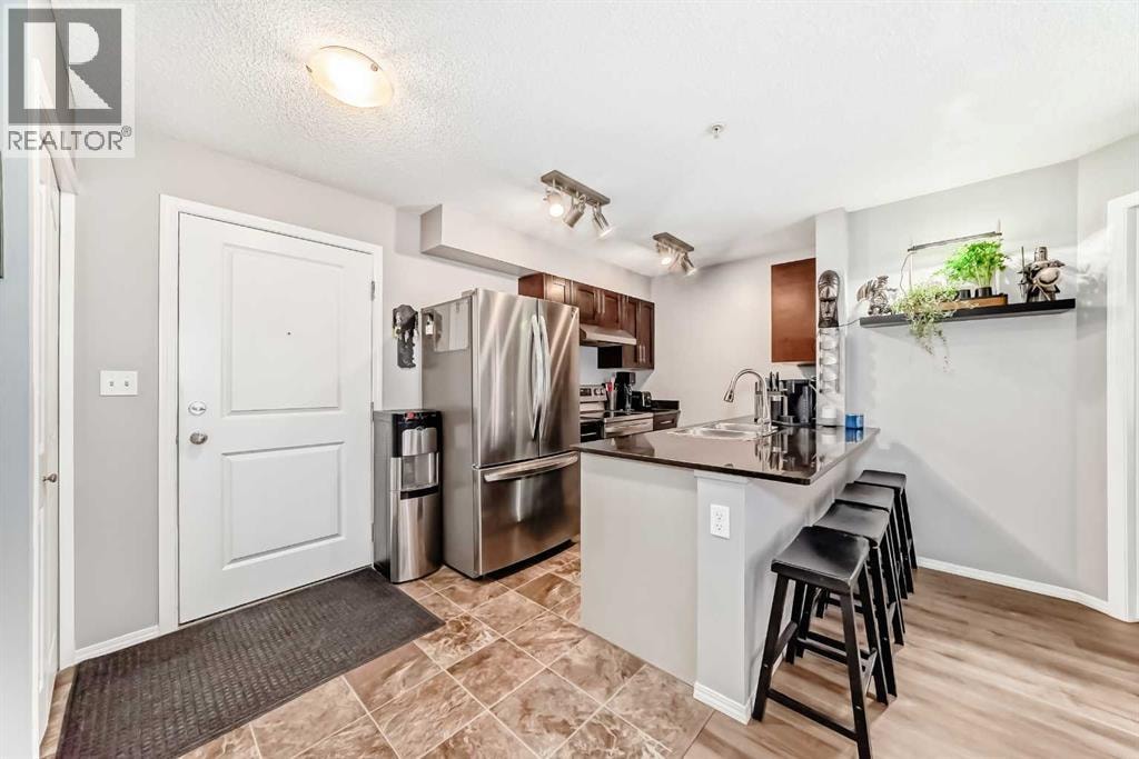 1208, 403 Mackenzie Way SW — photo 8