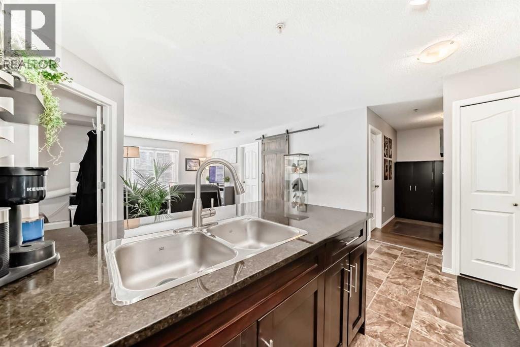 1208, 403 Mackenzie Way SW — photo 13