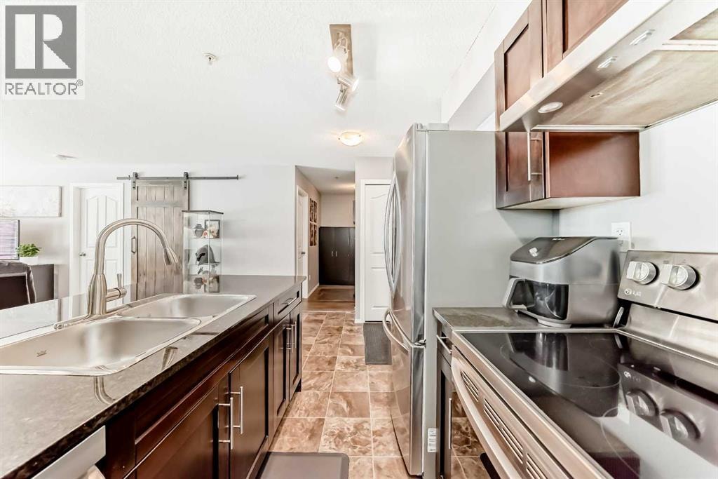 1208, 403 Mackenzie Way SW — photo 14