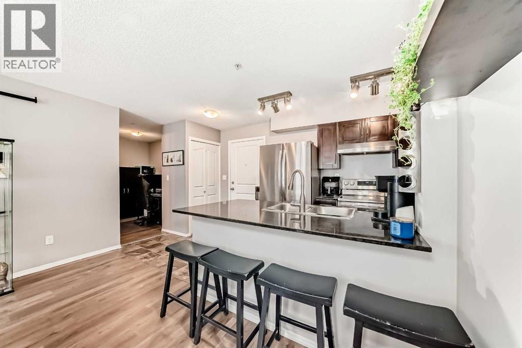 1208, 403 Mackenzie Way SW — photo 15