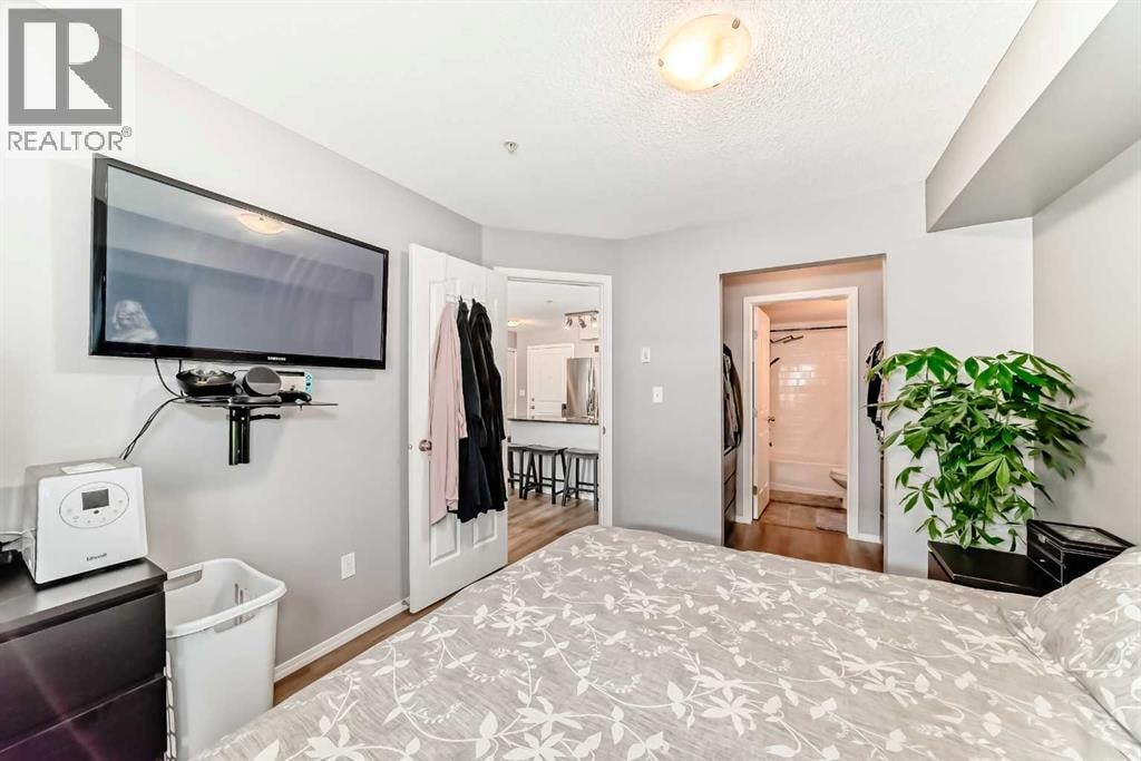 1208, 403 Mackenzie Way SW — photo 31