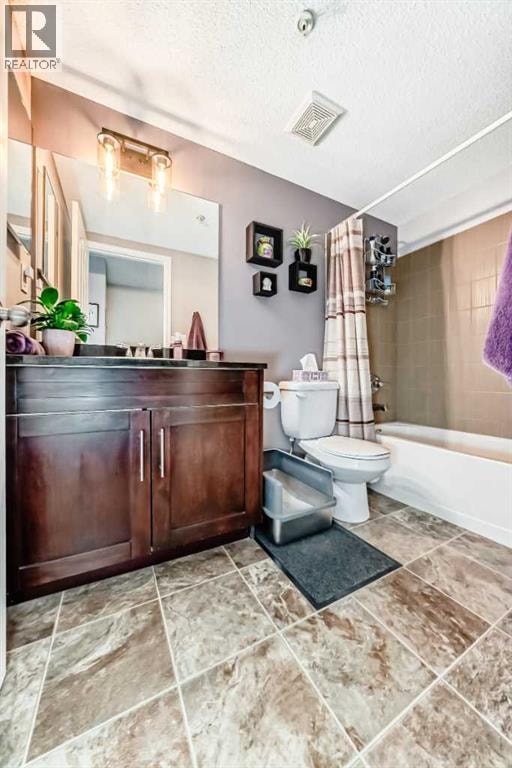 1208, 403 Mackenzie Way SW — photo 41