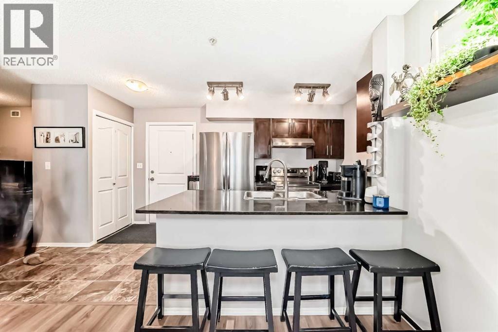 1208, 403 Mackenzie Way SW — photo 16