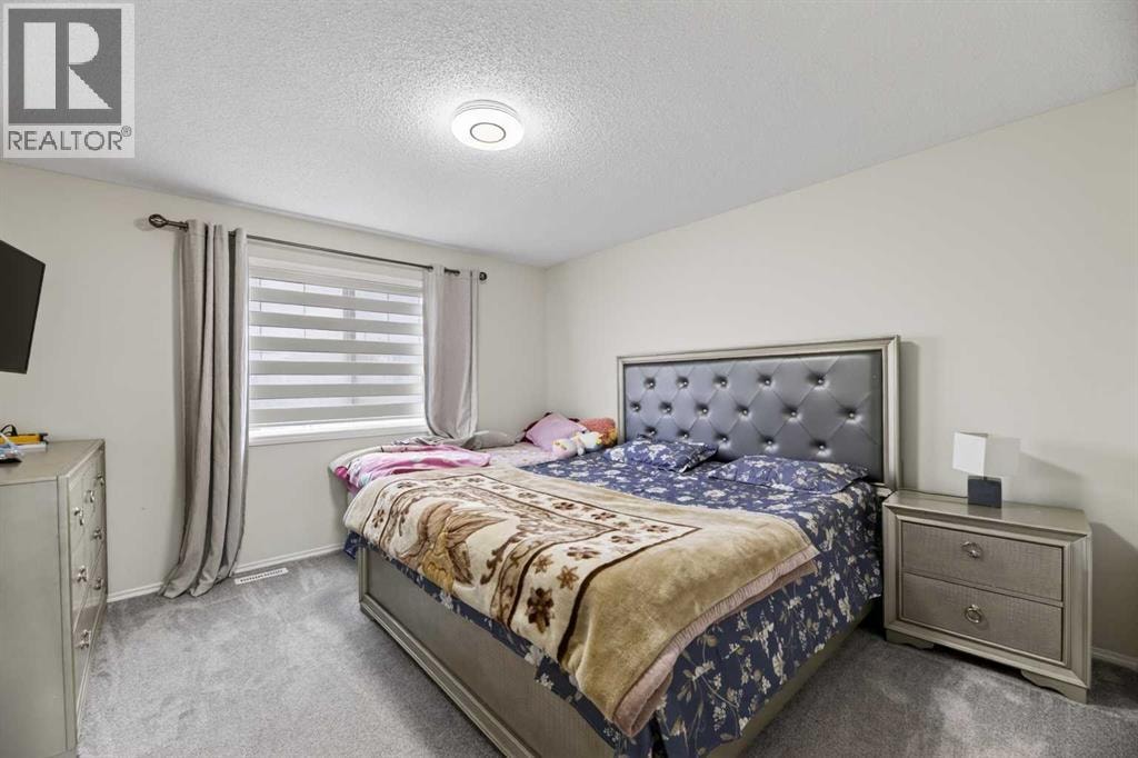 8474 Saddleridge Drive NE — photo 15