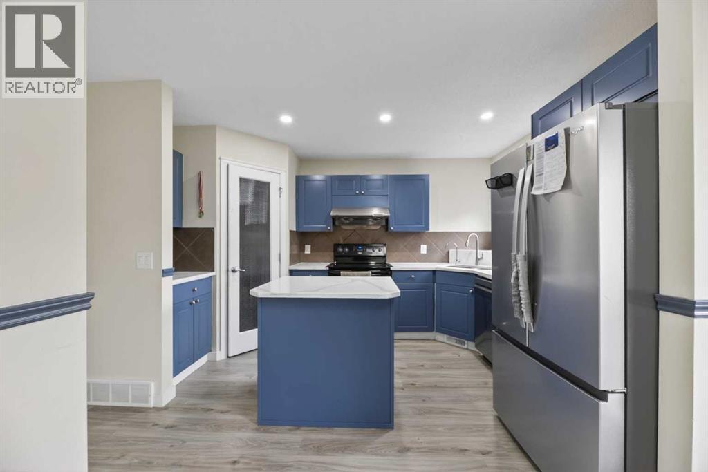 8474 Saddleridge Drive NE — photo 9