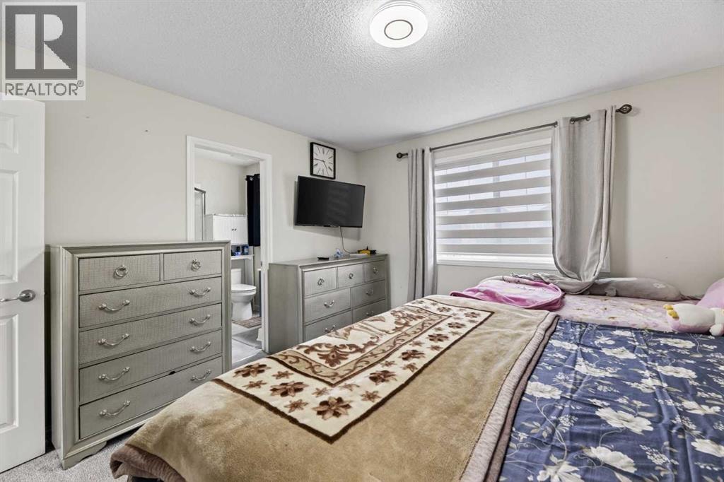 8474 Saddleridge Drive NE — photo 16