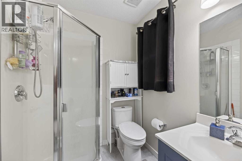 8474 Saddleridge Drive NE — photo 19