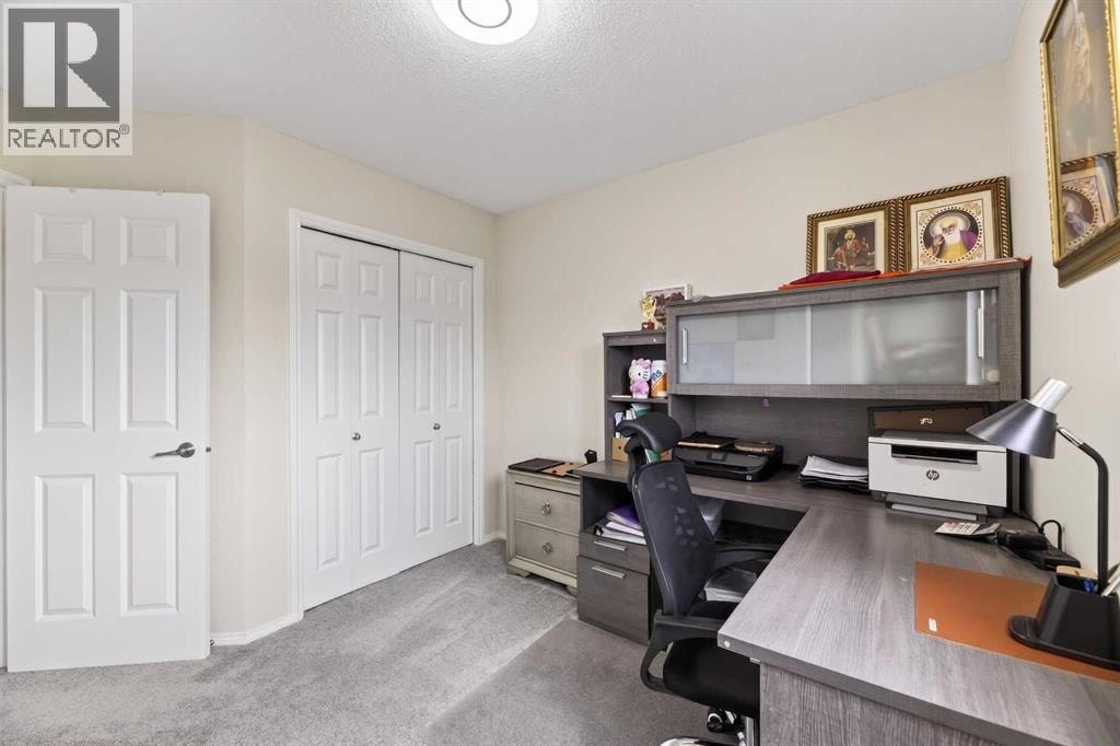 8474 Saddleridge Drive NE — photo 21