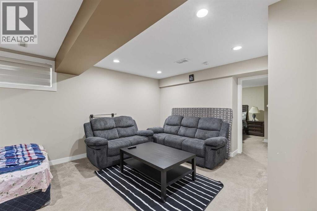8474 Saddleridge Drive NE — photo 24