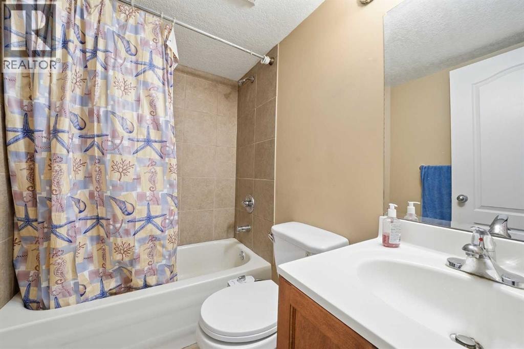 27 Saddleland Way NE — photo 33