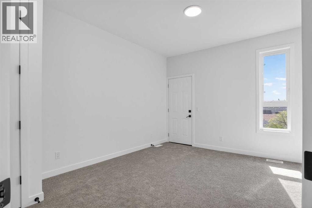 4907 Bowness Road NW — photo 16