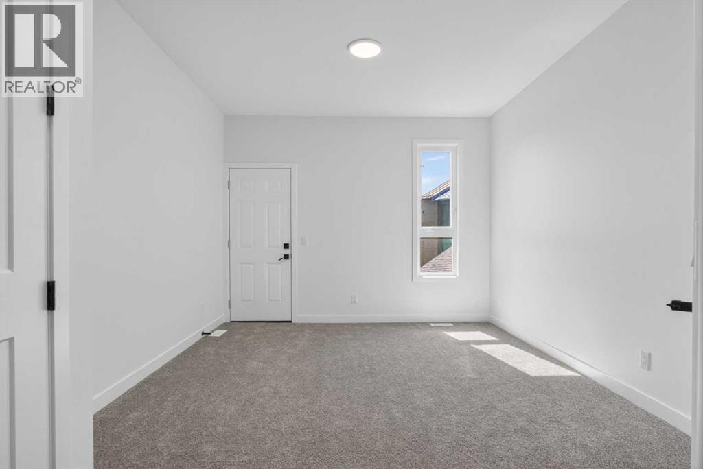 4907 Bowness Road NW — photo 15