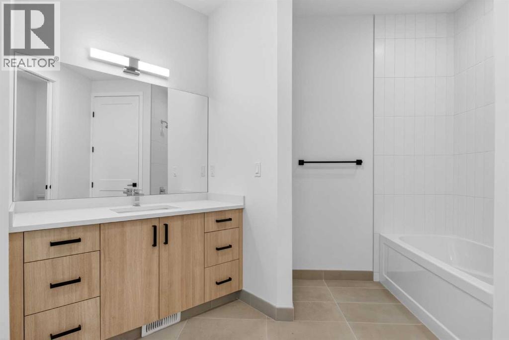 4907 Bowness Road NW — photo 14